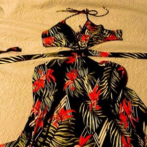 Halter maxi with cut outs ! Super cute and flirty. Great swimsuit coverup